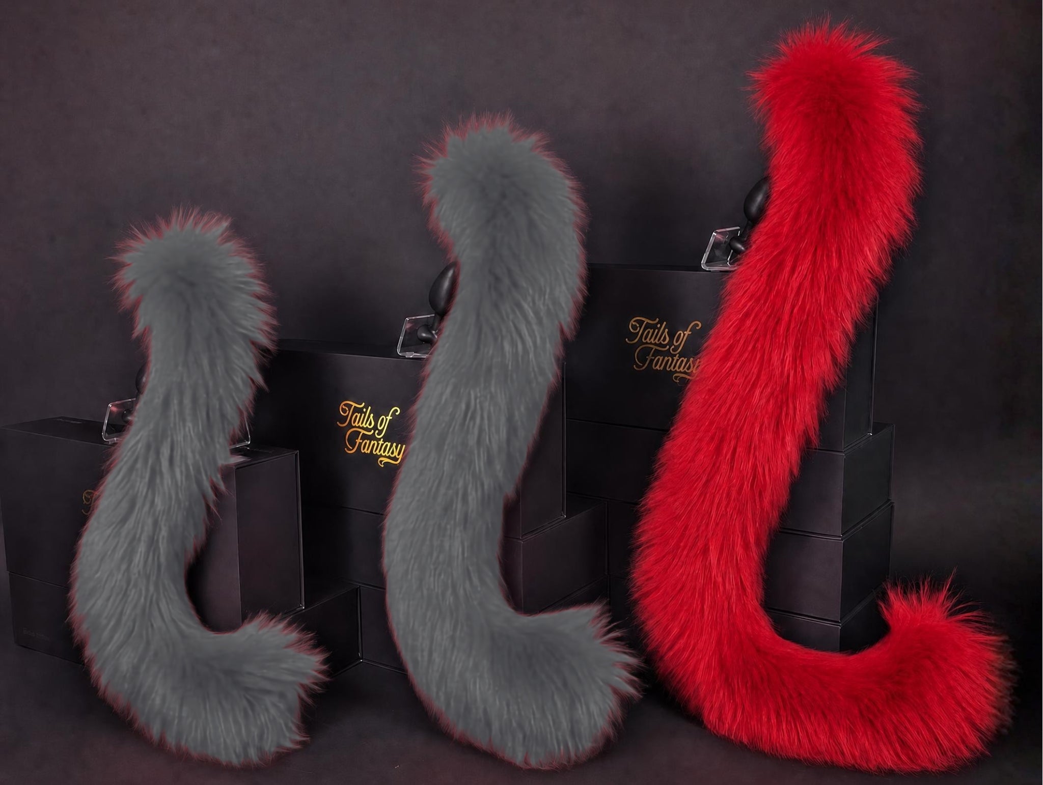 Tails of Fantasy Scarlet Cat Tail - Long Hair body-safe silicone butt plug featuring a unique upright support design - (large plug) studio display of the Scarlet Cat Tail - Long Hair.