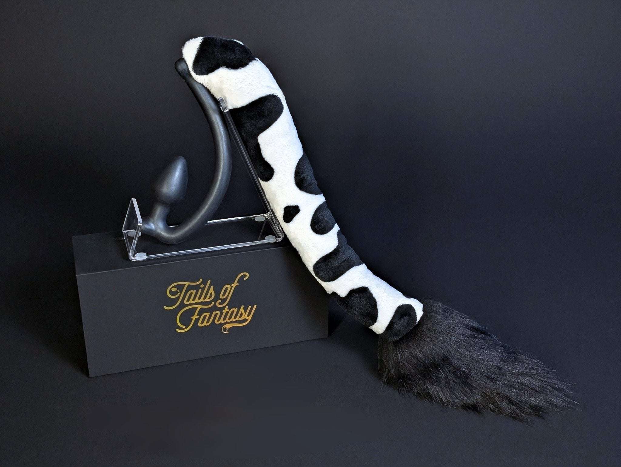 cow-tail cow tail butt plug with realistic faux fur tail and raised tail design