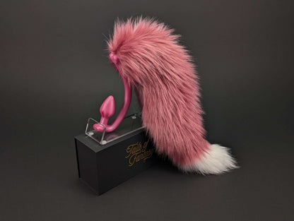 rose-pink-fox-tail fox tail butt plug in pink with realistic faux fur tail and raised tail design