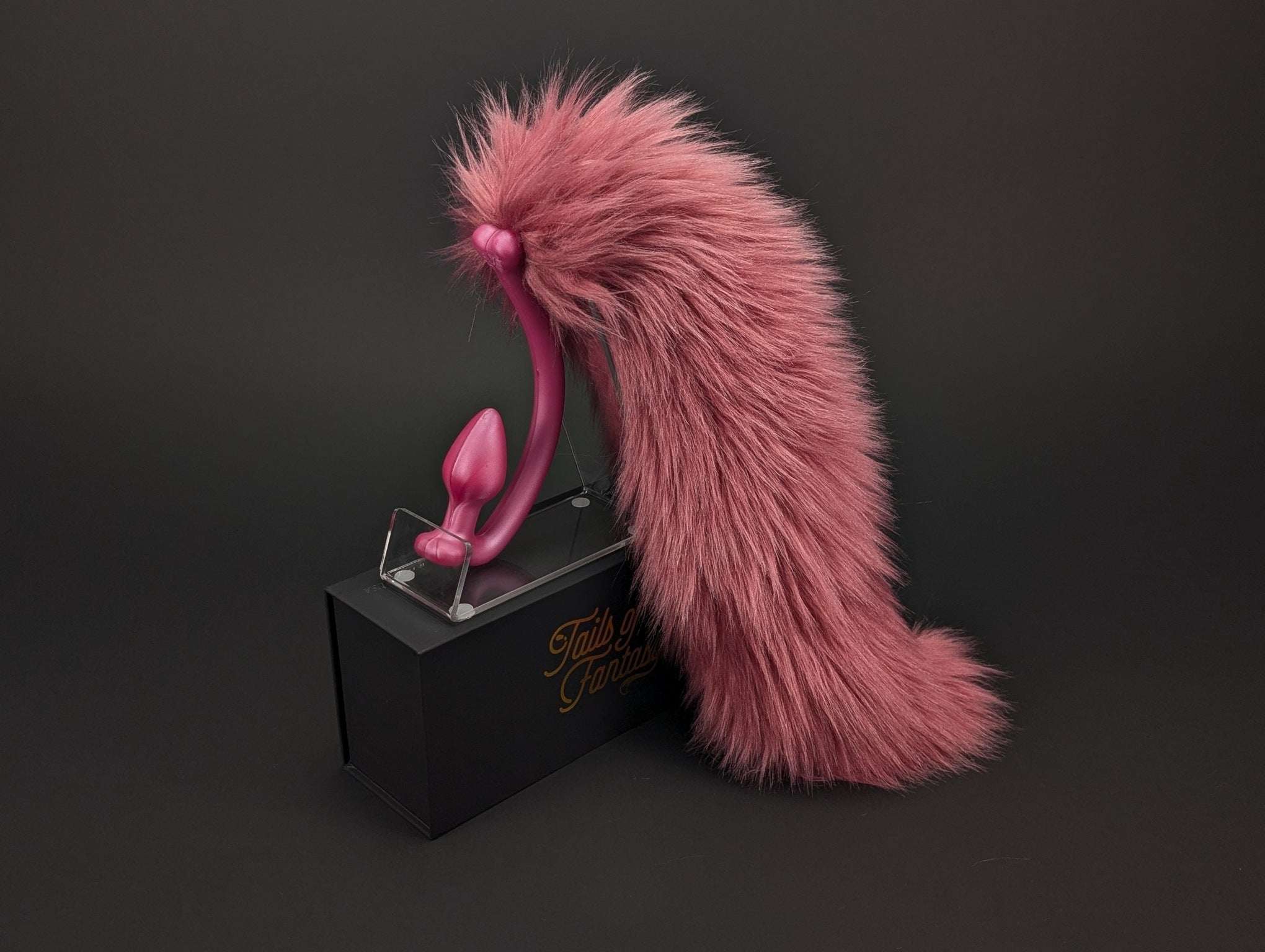 rose-pink-wolf-tail wolf tail butt plug in pink with realistic faux fur tail and raised tail design