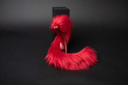 scarlet-cat-tail-long-hair cat tail butt plug in red with realistic faux fur tail and raised tail design