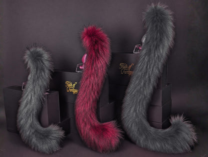 Tails of Fantasy Dark Fuchsia Cat Tail body-safe silicone butt plug featuring a unique upright support design - (medium plug) studio display of the Dark Fuchsia Cat Tail.