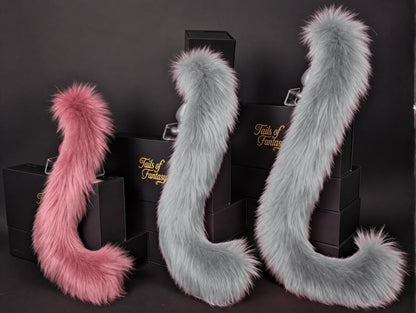 Tails of Fantasy Rose Pink Cat Tail - Long Hair body-safe silicone butt plug featuring a unique upright support design - (small plug) studio display of the Rose Pink Cat Tail - Long Hair.